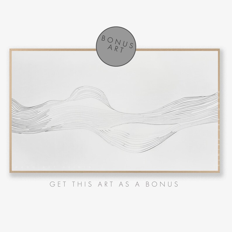 May include: Abstract art print with a white background and black lines forming a wave-like pattern. The print is framed in a light wood frame. The text "BONUS ART" is in a circle at the top of the image. The text "GET THIS ART AS A BONUS" is at the bottom of the image.