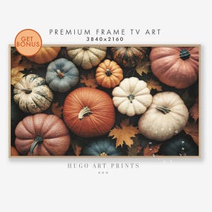 May include: A close-up of a group of pumpkins in various shades of orange, white, and pink, with some blue and green pumpkins in the background. The pumpkins are arranged on a bed of autumn leaves.