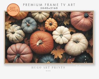 May include: A close-up of a group of pumpkins in various shades of orange, white, and pink, with some blue and green pumpkins in the background. The pumpkins are arranged on a bed of autumn leaves.