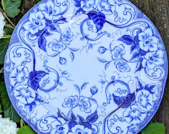 Plat rond ancien Creil et Montereau modèle Flora aux liserons