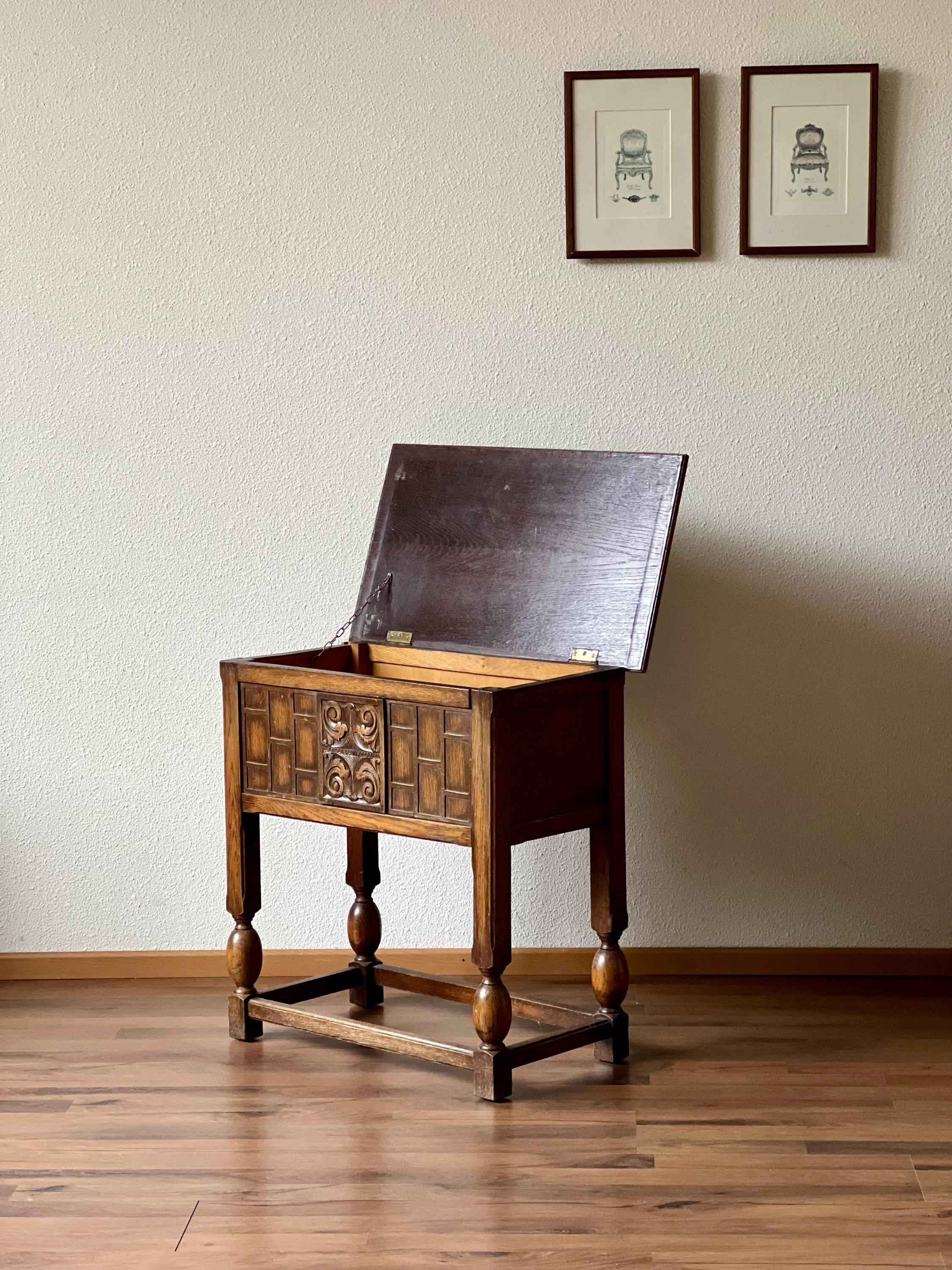 Hand-Carved Flap Oak Chest Table On Stand with Bobbin Legs , 1880s Ornately Carved Rustic Wooden Brutalist Decorative Storage Chest Cupboard