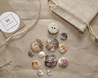 12 two-hole buttons, genuine mother-of-pearl button and staghorn button