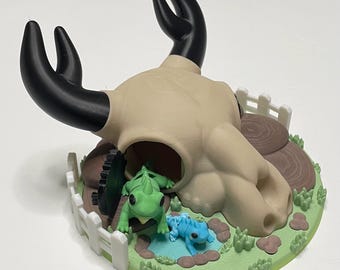 Casa con forma de cráneo de iguana impreso en 3D: Incluye 2 mini lagartijas flexibles.