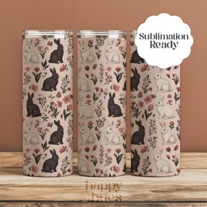 May include: Three stainless steel tumblers with a pink floral pattern and black and white bunnies. The tumblers are sublimation ready.