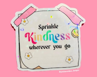 May include: A white sticker with a rainbow-colored text that says "Sprinkle Kindness wherever you go". The sticker has a pink and white daisy design and a pink and white tape design.