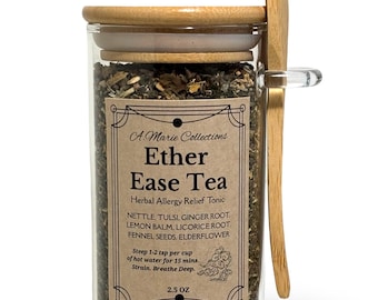May include: A glass jar of "Ether Ease Tea" with a wooden lid and spoon. The label reads "Herbal Allergy Relief Tonic" and lists ingredients like nettle and ginger root. The jar contains 2.5 oz of tea and is designed for steeping in hot water.