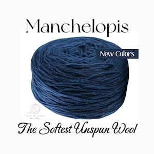 May include: A skein of deep blue Mancheltopis unspun wool. The label reads "New Colors" and "The Softest Unspun Wool".