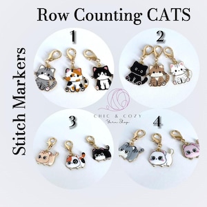 May include: Set of eight colorful cat-shaped stitch markers for knitting and crocheting. The markers are numbered 1 through 4, with two markers per number. Each marker features a different cat design.