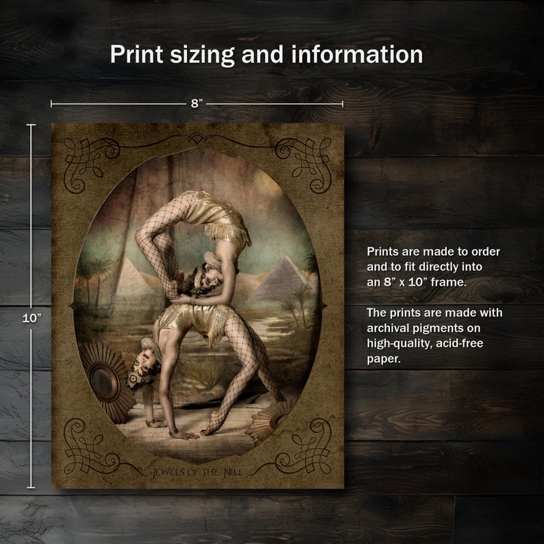 May include: A vintage-style print of two women performing an acrobatic pose in front of a desert landscape. The print is framed in a decorative border and includes the text "Jewels of the Nile". The print is 8 inches wide and 10 inches tall.