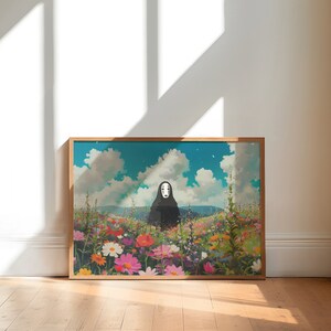 May include: A framed print of a black and white character with a blank face standing in a field of colorful flowers. The background is a blue sky with white clouds.