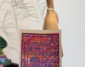 How to Survive Capitalism | Lino Print on Hand-painted Watercolour Recycled Card