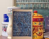 How to Survive Capitalism | Lino Print on Hand-painted Watercolour Recycled Card