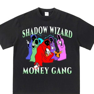 May include: Black t-shirt with a graphic print of a group of cartoon figures wearing robes and the text "SHADOW WIZARD MONEY GANG".