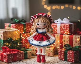 May include: A crocheted doll with blonde yarn hair, wearing a red and white dress with snowflake patterns and a matching bonnet. The doll has dark eyes, rosy cheeks, and red boots, standing upright among several red gift boxes with green ribbons.