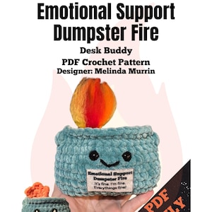 May include: A teal blue crocheted plush toy shaped like a small trash can with a flame on top. The toy has a smiling face and a tag that reads "Emotional Support Dumpster Fire. It's fine. I'm fine. Everything's fine!" The image also includes the text "PDF ONLY".