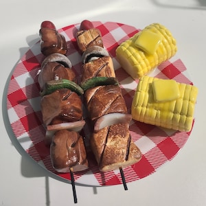 May include: A set of three ceramic mugs with a speckled, matte finish. The mugs are in shades of cream, light gray, and dark gray. Each mug has a simple, minimalist design, perfect for coffee or tea.