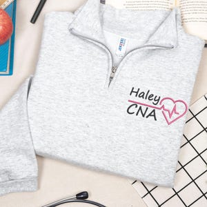 Nurse Embroidered Quarter Zip Sweatshirt - New Nursing Student Pullover - Custom Nurse Gift RN LPN CNA - Graduation Gifts for Nurses