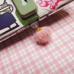 Pink Fluffy Pom Pom dust plug available for multiple devices!