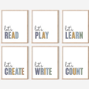 May include: Six framed prints with the text "let's" followed by a different word in colourful letters. The words are "READ", "PLAY", "LEARN", "CREATE", "WRITE", and "COUNT".