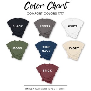 May include: Color chart showcasing a variety of unisex garment-dyed t-shirts in different colors. The colors include black, pepper, white, moss, true navy, ivory, and brick. The text "Color Chart" and "Comfort Colors 1717" are at the top.