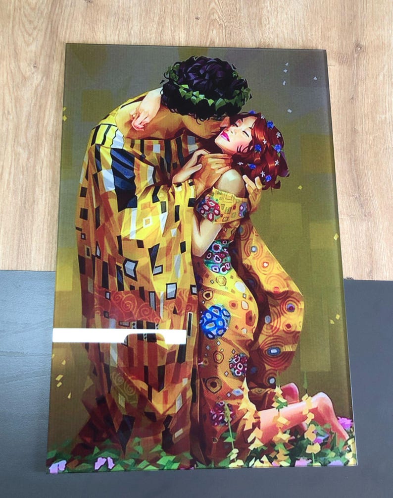 May include: A colourful painting of a couple embracing in a field of flowers. The painting is done in a style reminiscent of Gustav Klimt's "The Kiss" with a mosaic-like pattern of gold, yellow, and blue.