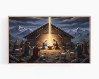 May include: A framed print depicting the Nativity scene. The artwork shows Mary, Joseph, and baby Jesus in a stable, surrounded by shepherds, sheep, and an ass. The background features mountains and a night sky.