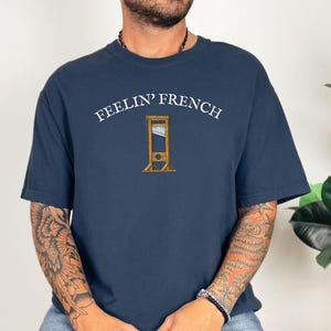 Komfortfarben Feelin Französisches Guillotine-Shirt, Antikapitalismus-soziale Gerechtigkeit Freiheitliche Linke-Revolution-T-Stück, essen die Reichen, erwarten Widerstand