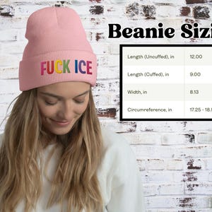 May include: A light pink beanie with the text "FUCK ICE" in rainbow colors. The beanie's dimensions are: 12 inches long (uncuffed), 9 inches long (cuffed), 8.13 inches wide, and a circumference of 17.25-18.50 inches.