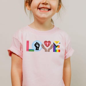 Liberal LOVE Tutina per neonati/maglietta per bambini, anti Trump, libri vietati, BLM, LGBT, diritti riproduttivi, giustizia sociale, mini maglietta femminista
