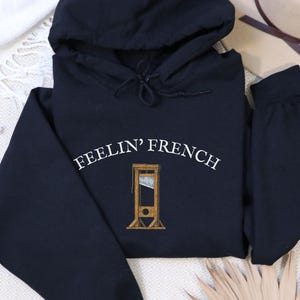 Sudadera con capucha "Siente la guillotina francesa", protesta anticapitalista, de justicia social, liberal, izquierdista, anarquista y anárquico. ¡Cómete a los ricos, espera resistencia!