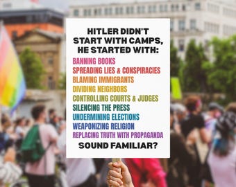 May include: A white sign held up in a crowd of people with the text "HITLER DIDN'T START WITH CAMPS, HE STARTED WITH:" followed by a list of actions in various colors. The sign ends with "SOUND FAMILIAR?"