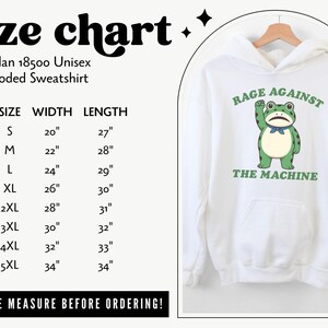 May include: White hooded sweatshirt with a green frog graphic and the text "RAGE AGAINST THE MACHINE." The size chart shows measurements in inches for a Gildan 18500 Unisex Hooded Sweatshirt. The chart includes sizes S to 5XL, with widths from 20" to 34" and lengths from 27" to 34".