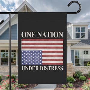 May include: Black garden flag with the text "ONE NATION UNDER DISTRESS" in white. The flag features a distressed American flag design with red and white stripes and a blue field of white stars.