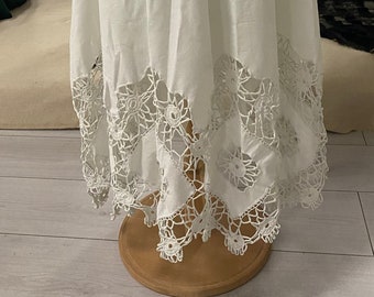 Antique Petticoat, 1900-1920, Europe. White chintz. Decorated along the edge with thin crochet inserts. In a good condition.