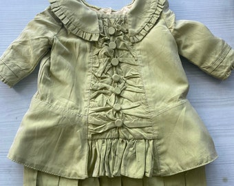 Reconstruction of an Antique Doll Dress. For a doll 75 cm. Natural taffeta in a beautiful soft green color. The taffeta is antique.