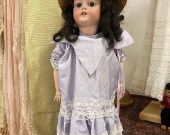 Vintage Dress, 1940-1950, Europe. Lilac silk and antique lace for a doll of 75-80 cm . The skirt is wide. Back fastening with buttons.