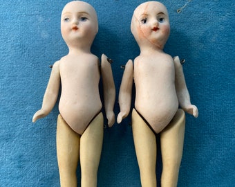 Two Museum Antique Porcelain Twin Dolls, 1910-1920, Germany. In shoes. Legs and arms move well. Height 10 cm.