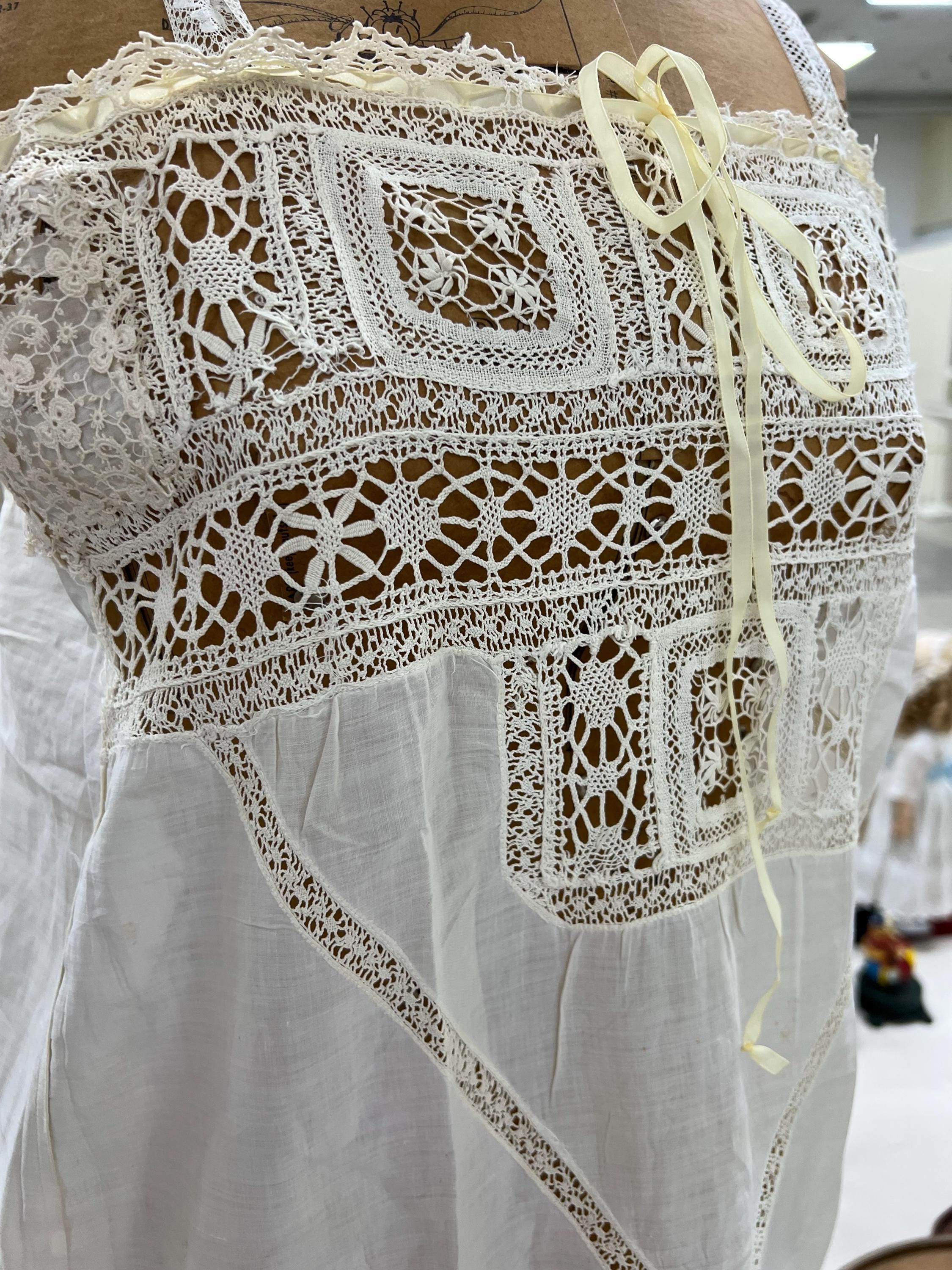 antique nightgown 1900. Europe. white cambric fabric. lots of embroidery on the chest. no straps (need to be sewn on and a piece is missing