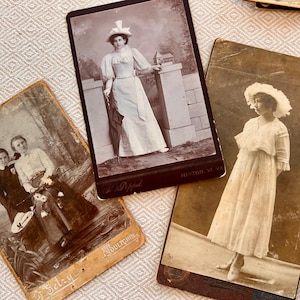 Antique children's photos 1900. Three old antique photographs. Ladies in hats. On thick cardboard. The city is inscribed "Tulchynt." The sec