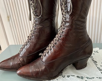 Women's shoes, circa 1900. USA. Women's high-heeled boots. High-quality genuine leather, brown with a brown tint. Lace-up front. Elegant and