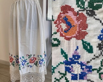 Antique Skirt With Embroidery, 1900-1930, Poland. Handmade towel. Drawing - "red roses and blue irises." White sweater. Hand-knitted lace.