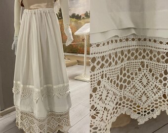 Antique Women's Petticoat, 1900-1920, Europe. White chintz. Decorated with 2 rows of hand-crocheted lace. In a good condition.