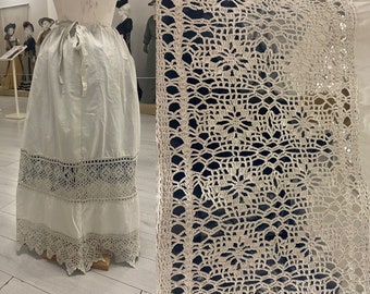 Antique Women's Petticoat, 1910-1940, Ukraine. White chintz. The bottom is hand-crocheted lace. 3 rows of wide lace.