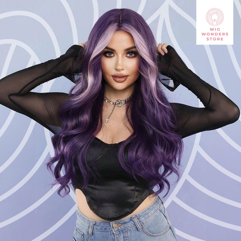 May include: A woman with long, wavy purple and light purple hair. She is wearing a black top and blue jeans. The image includes the text "Wig Wonders Store" in a circular logo.