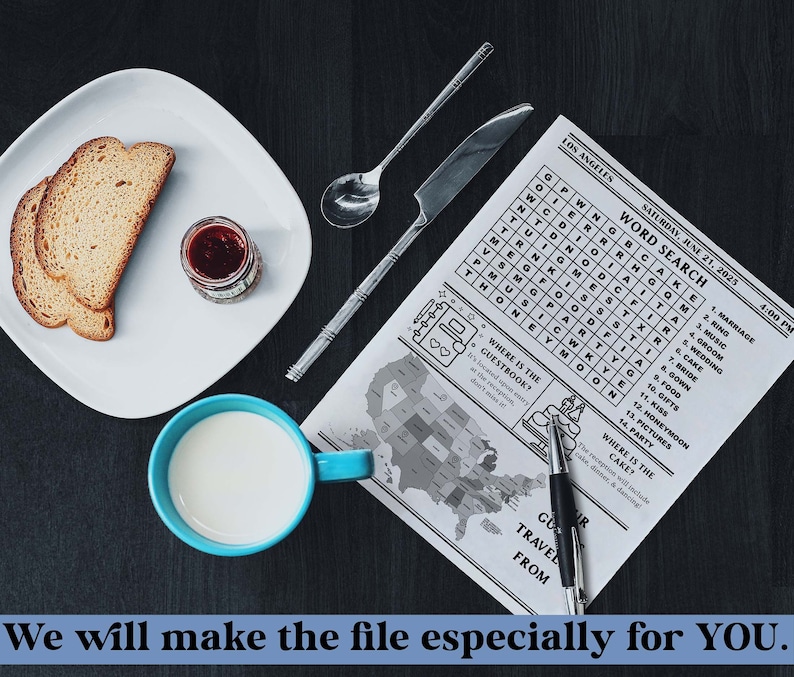 May include: A black and white word search puzzle with the title "Word Search" and the date "Saturday, June 21, 2025". The puzzle is on a white sheet of paper with a map of the United States in the background. There is a blue cup with milk, a plate with two slices of bread, a small jar of jam, and a silver spoon on a dark wooden surface.