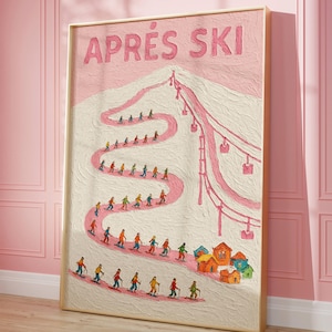 Può includere: Una stampa artistica incorniciata con una scena di stazione sciistica rosa e bianca. Le parole "APRÈS SKI" sono in alto. L'opera raffigura sciatori su una pista tortuosa, una seggiovia ed edifici colorati in basso. La cornice è dorata.