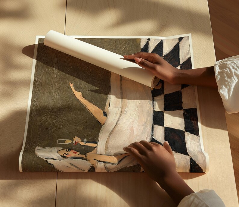 May include: A rolled art print featuring a painted illustration of a person relaxing in a bathtub with a glass of champagne. The scene includes a black and white checkered floor pattern, a dark olive background, and a white towel wrapped around the head.