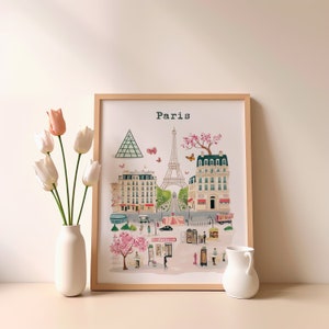 May include: A framed print with a colorful illustration of the Eiffel Tower and other Parisian landmarks. The print is titled "Paris" and features a light blue sky with pink and white flowers.
