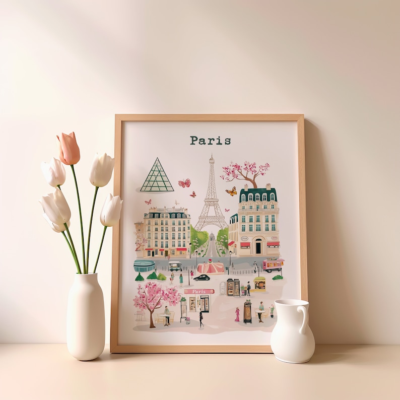 May include: A framed print with a colorful illustration of the Eiffel Tower and other Parisian landmarks. The print is titled "Paris" and features a light blue sky with pink and white flowers.