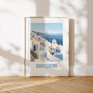 May include: A colorful illustration of Santorini, Greece, with white buildings, blue accents, and a blue ocean in the background. The text "SANTORINI" is printed in bold, blue letters below the image.